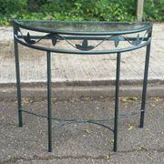 Grey-green wrought iron half-moon console with glass, 85cm.