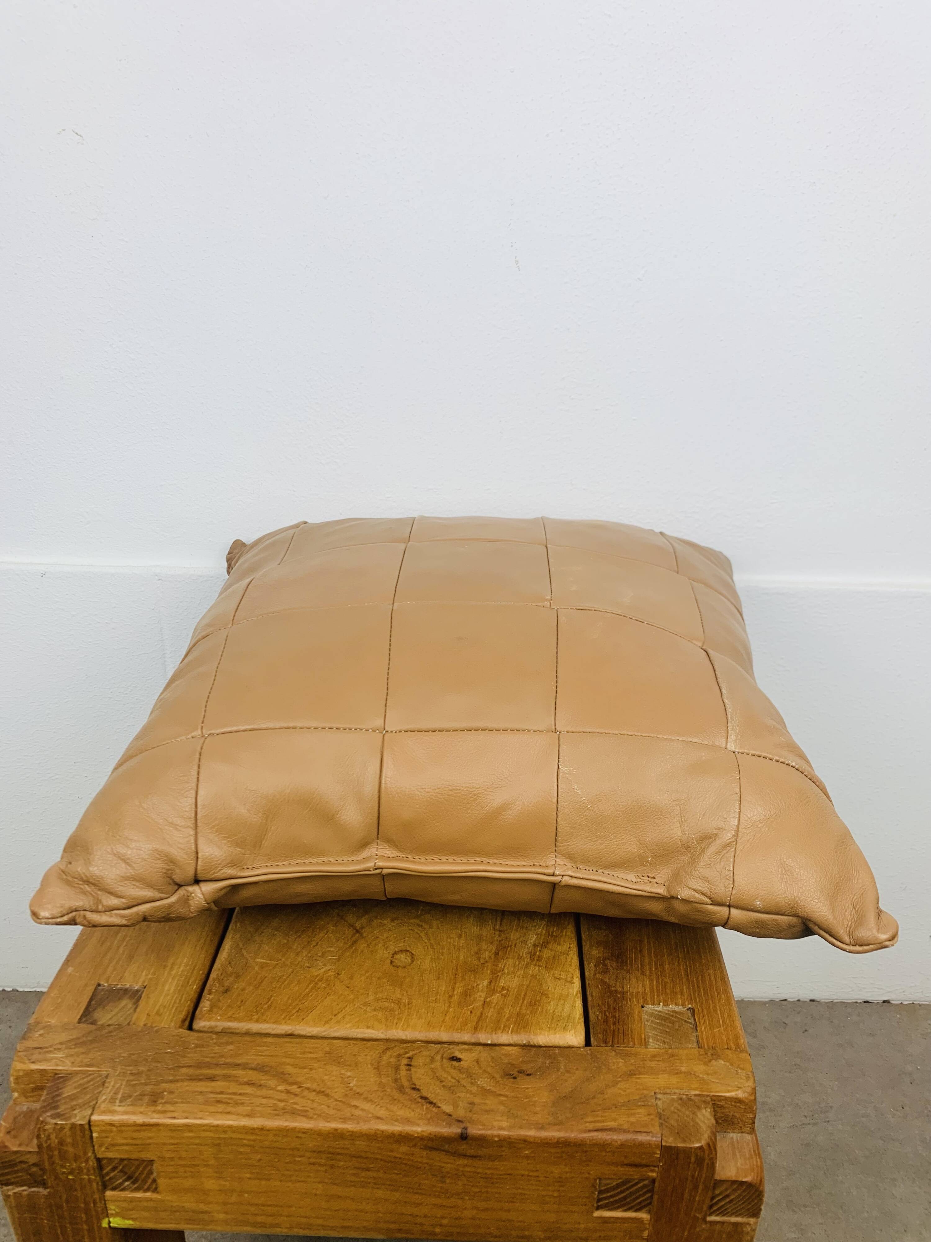 Vintage patchwork leather cushion