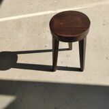 Small high tripod stool in brown solid wood