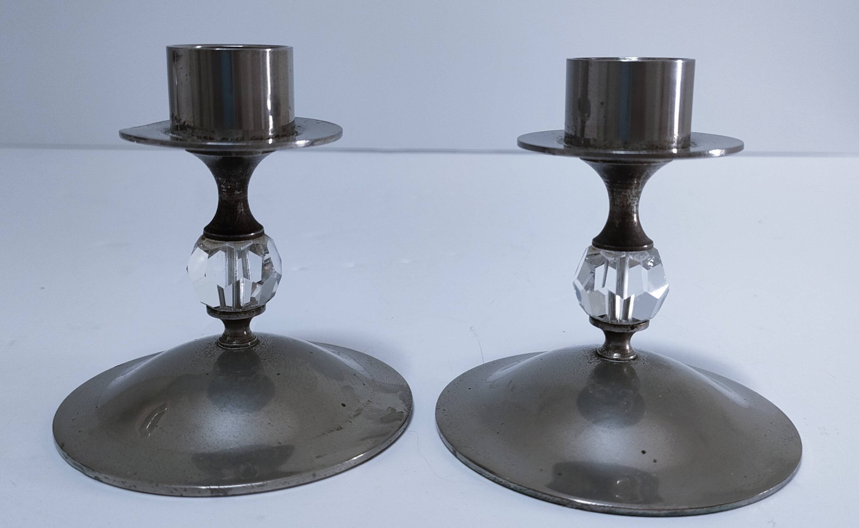Three vintage metal chrome glass candlesticks