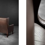 Brown leather wingback chair in mid-century modern Danish style, 1960s.