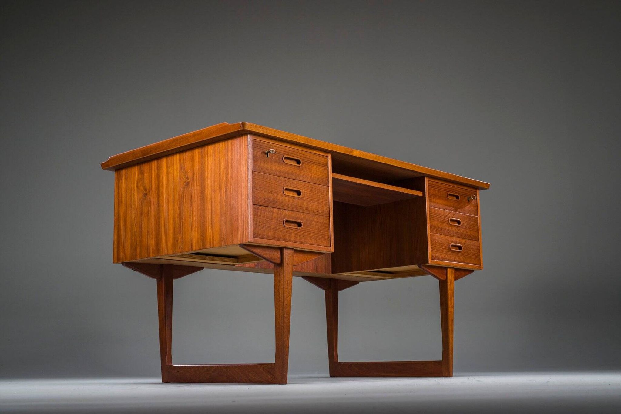 Mid-century Danish freestanding teak desk with raised lip edge, 1960s