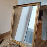 Miroir en bois, doré à la feuille d'or.