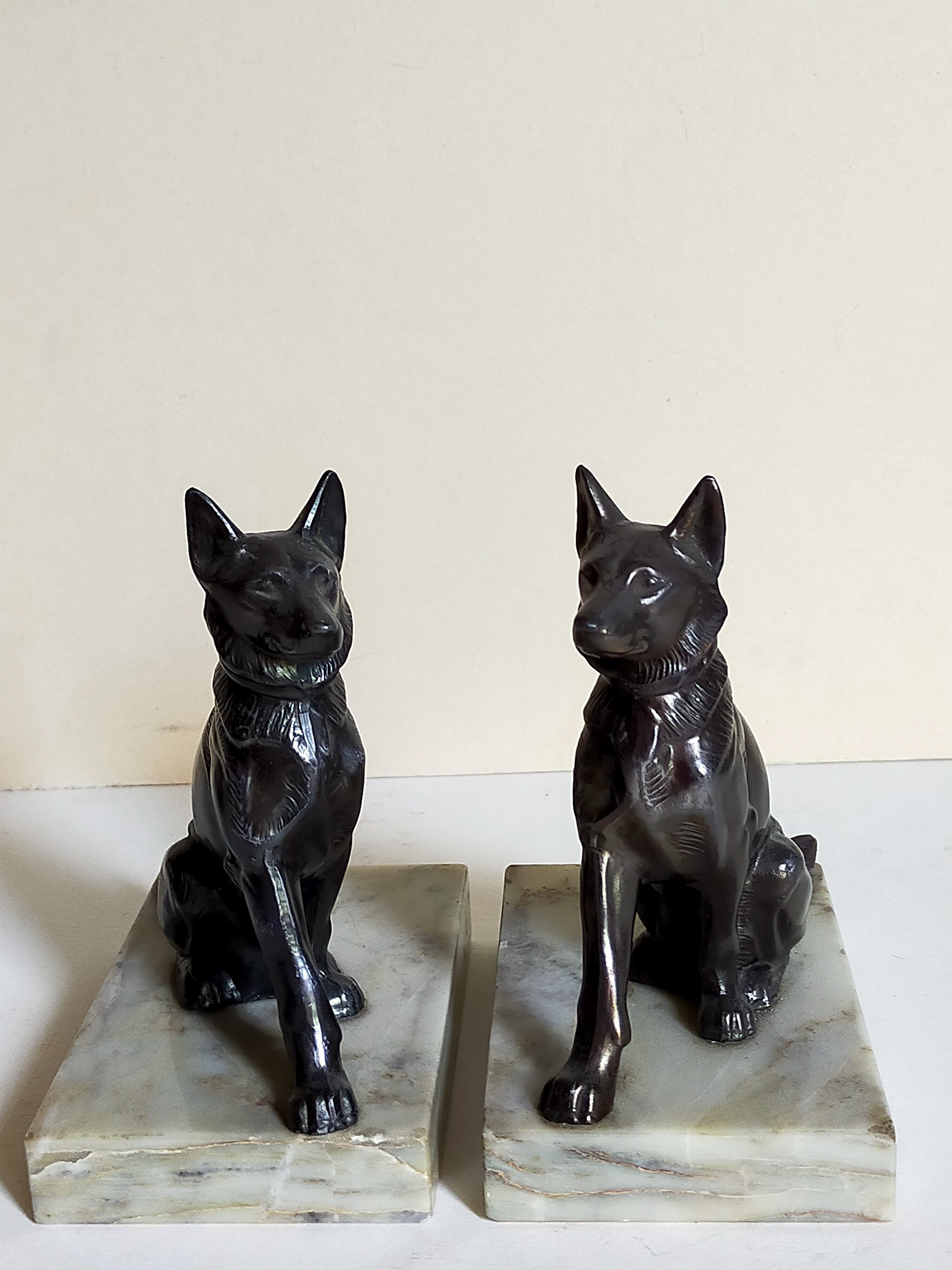 Pair of Art Deco bookends to signed wolf dogs