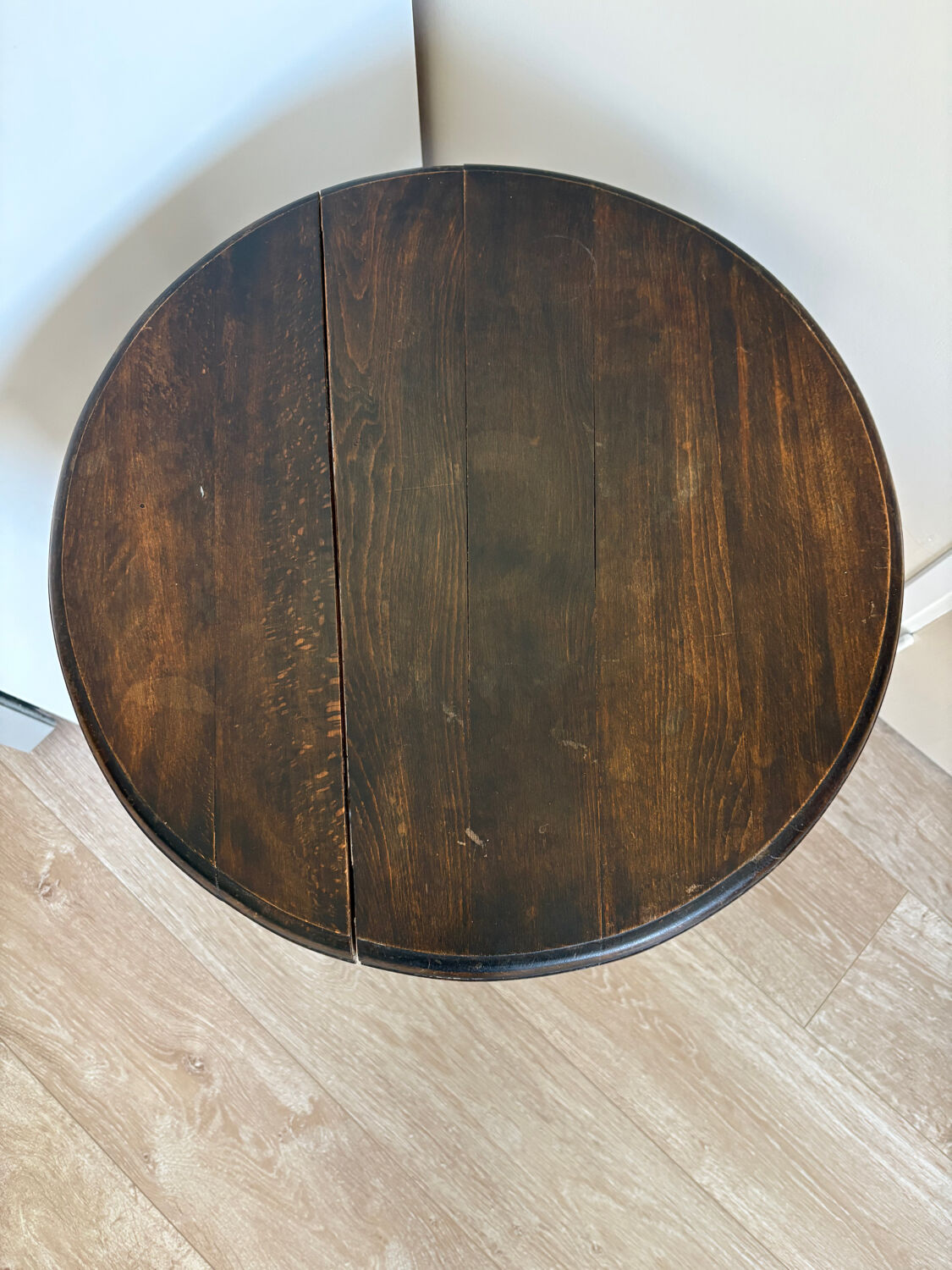 Antique turned wooden side table with authentic charm.