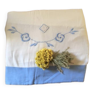 Embroidered cotton linen sheet with blue border