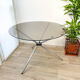 Round tripod table in smoked glass Roche Bobois 70