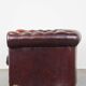 Original English Chesterfield sofa in red cowhide 2 seater