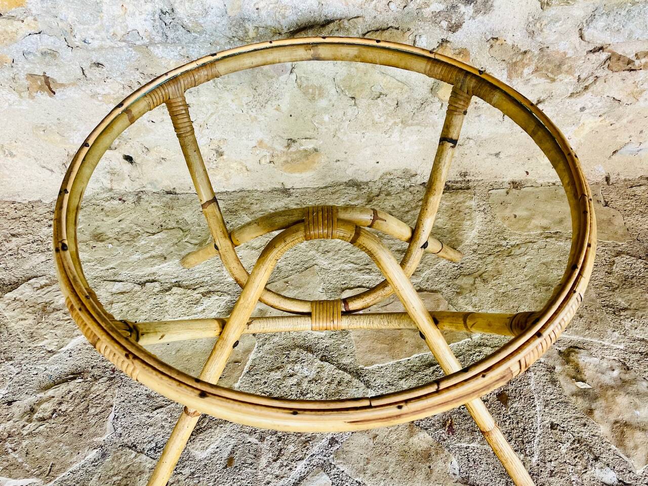 Round bamboo and rattan coffee table with glass top, circa 1960s