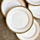 6 assiettes à dessert en porcelaine blanche et dorée