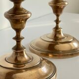 Pair of antique candle holders in solid brass