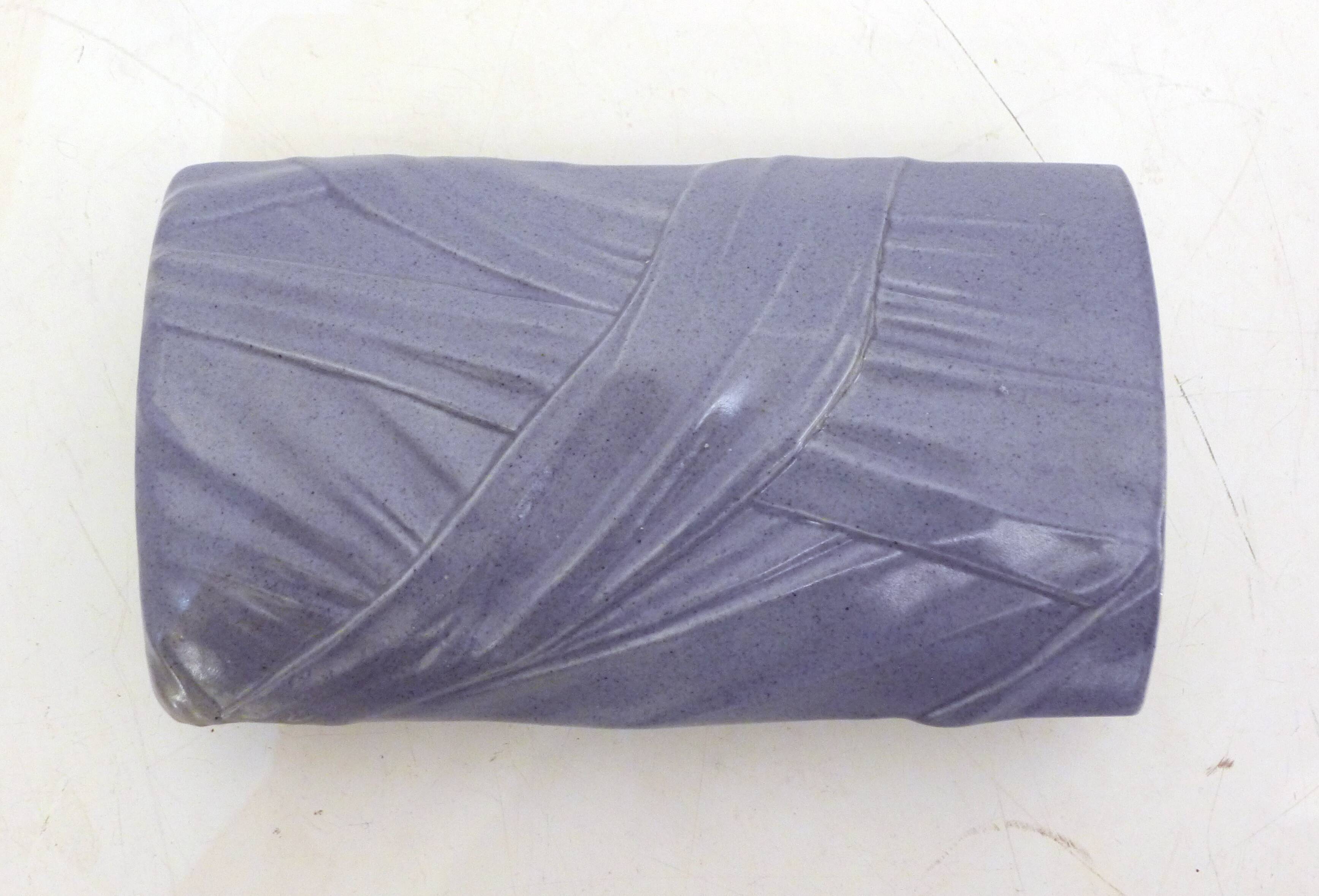 Purple vase, draped ribbons in relief