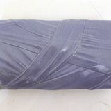 Purple vase, draped ribbons in relief