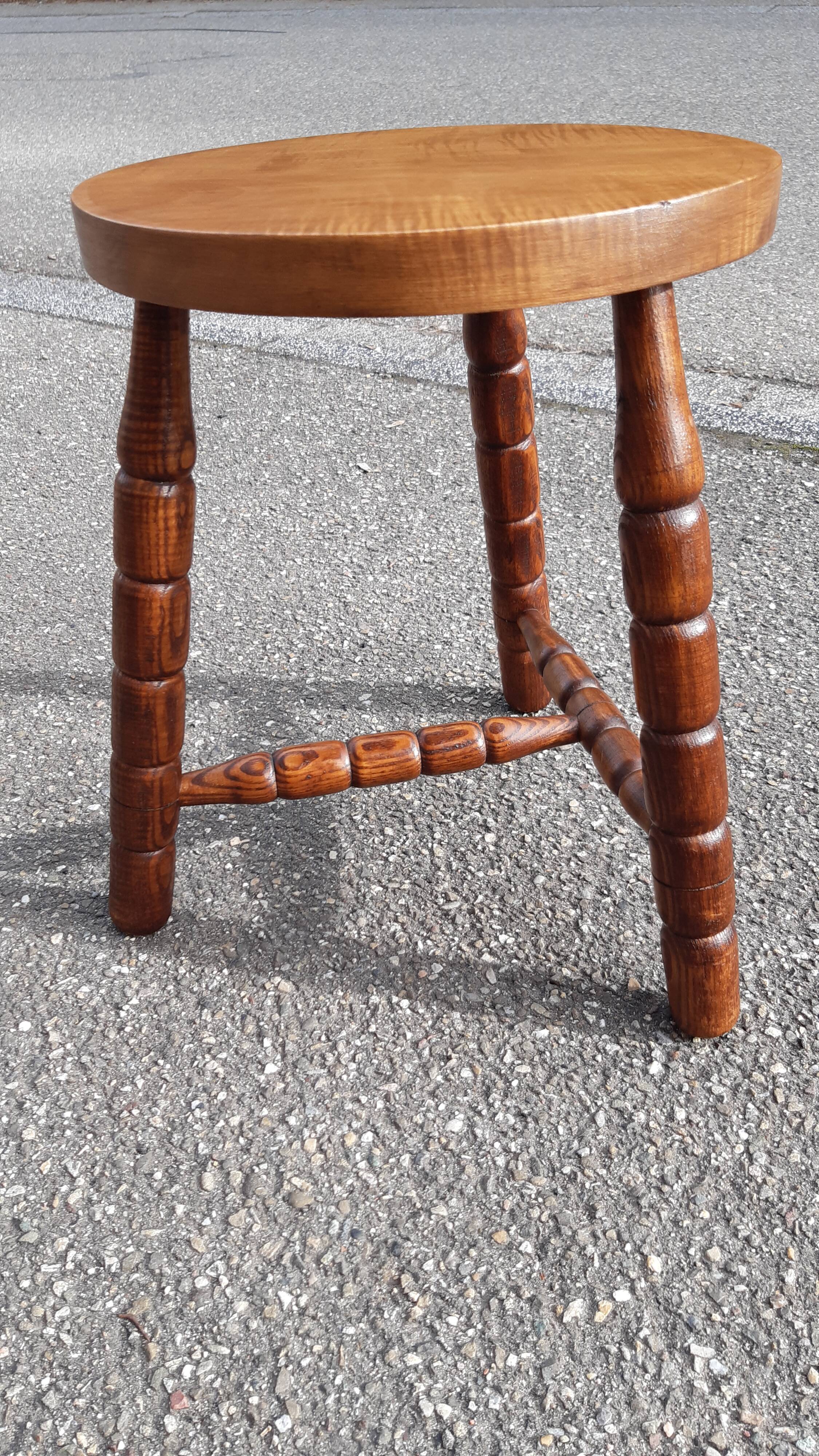 Wooden tripod stool with turned legs