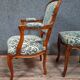 Cabriolet armchair in cherry wood with its footrest, 20th century.