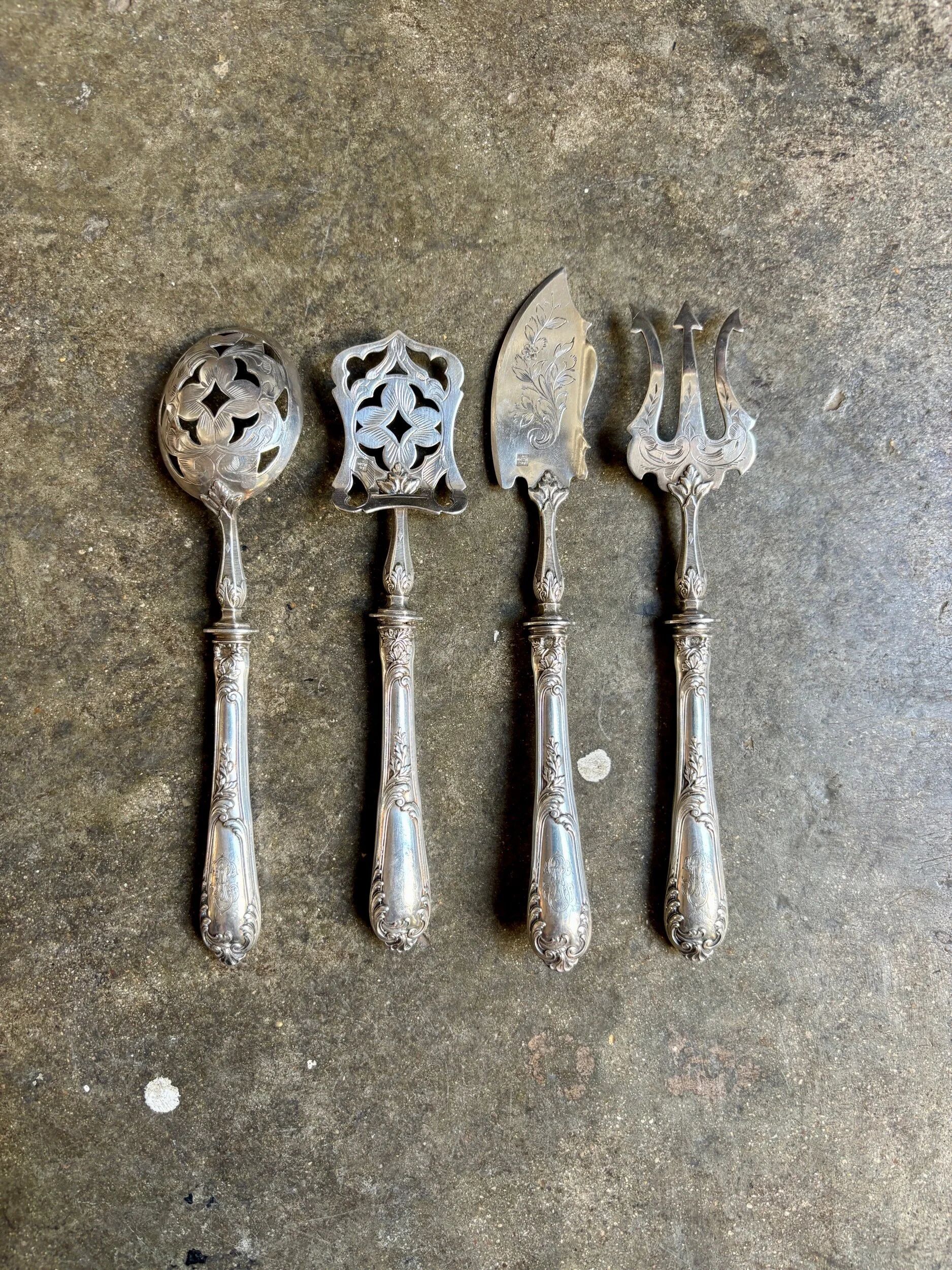 4 silver bonbon spoons engraved "HS"