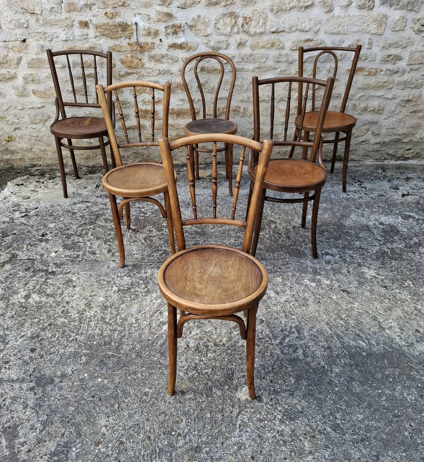 6 mismatched bistro chairs