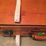 Thick leather suitcase