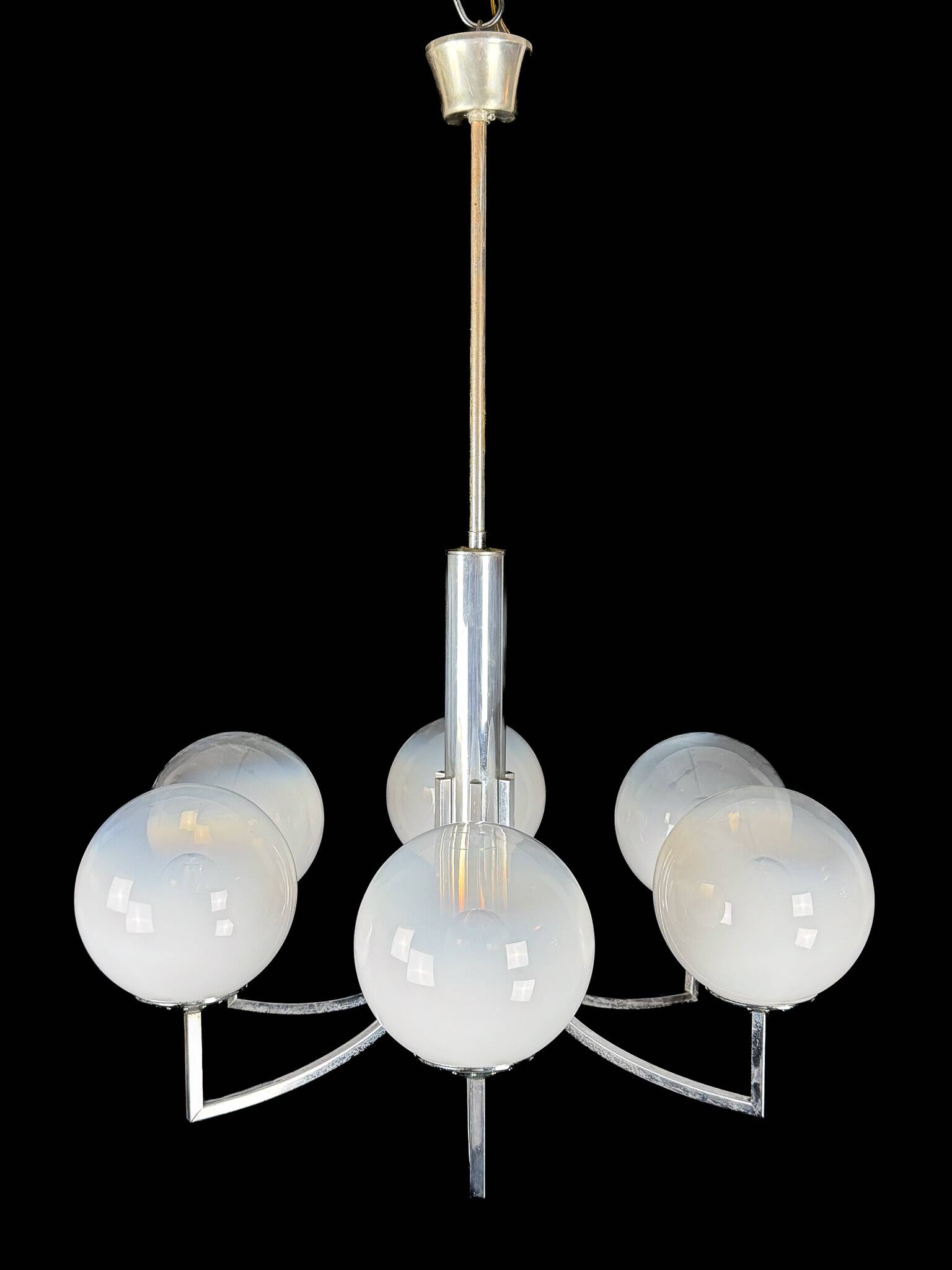 Six arms chandelier in murano glass spheres and chrome. Italy 1960s