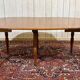 Round cherry wood table, 6 feet, Louis Philippe style with 2 extensions.