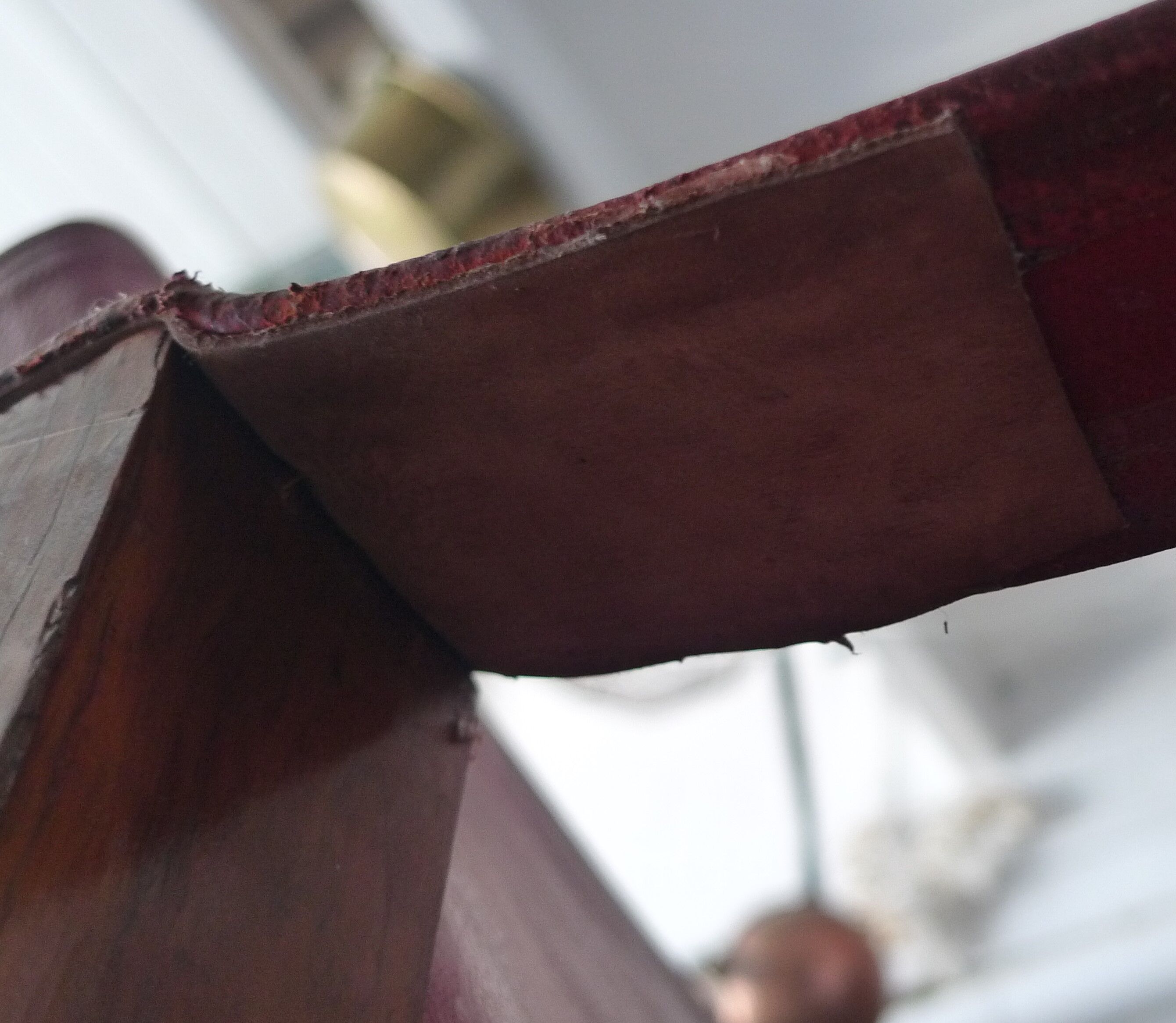 Leather and wood relaxed armchair