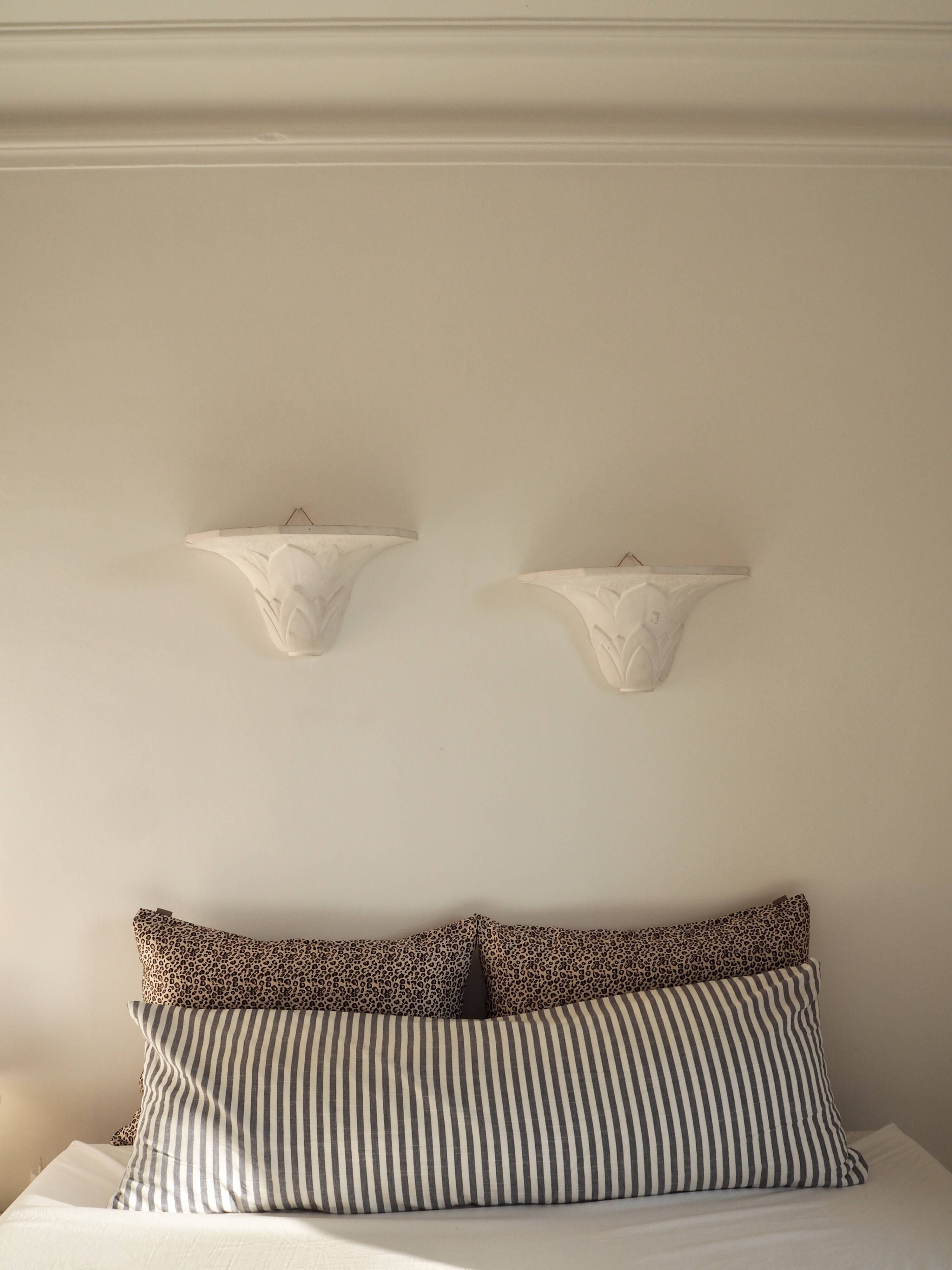 Pair of plaster wall sconces, palmette decoration, 20th century