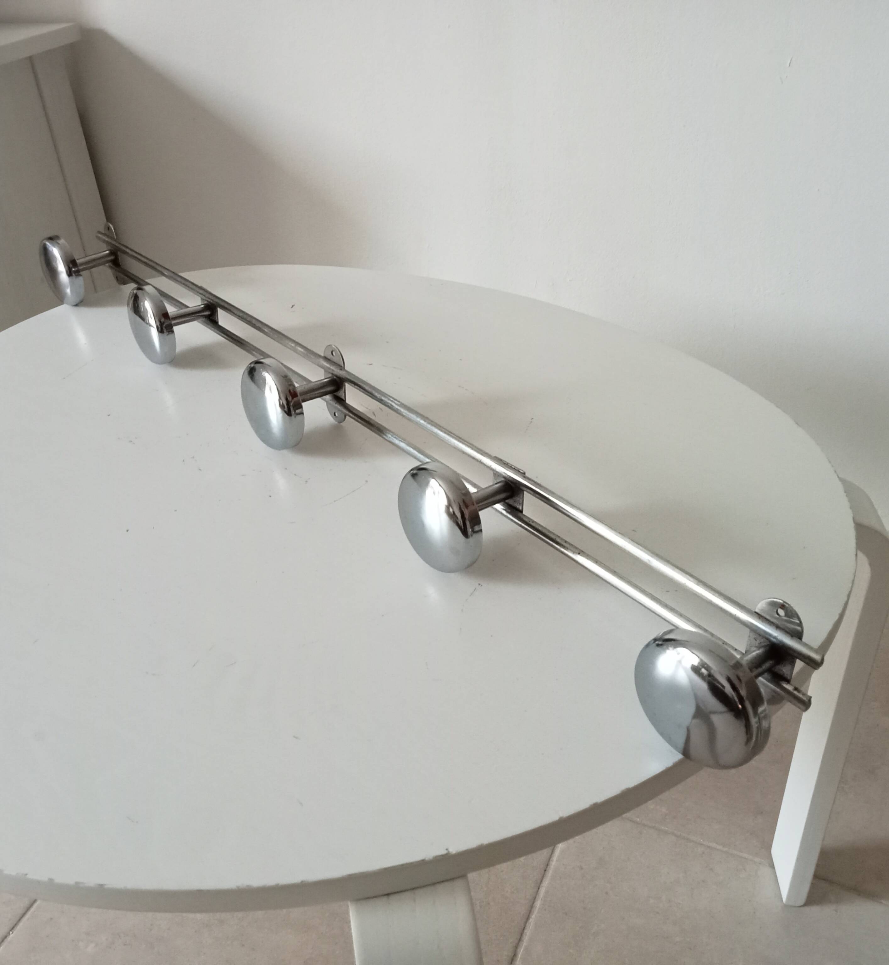 Vintage chrome wall-mounted coat rack from the 1970s