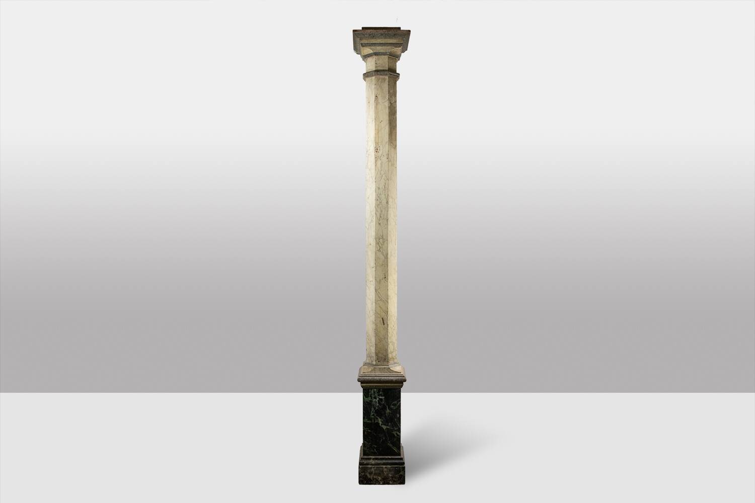 Pair of wooden columns painted to imitate marble. 1880s.