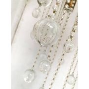 Contemporary ivory florentine iron and crystals chandelier
