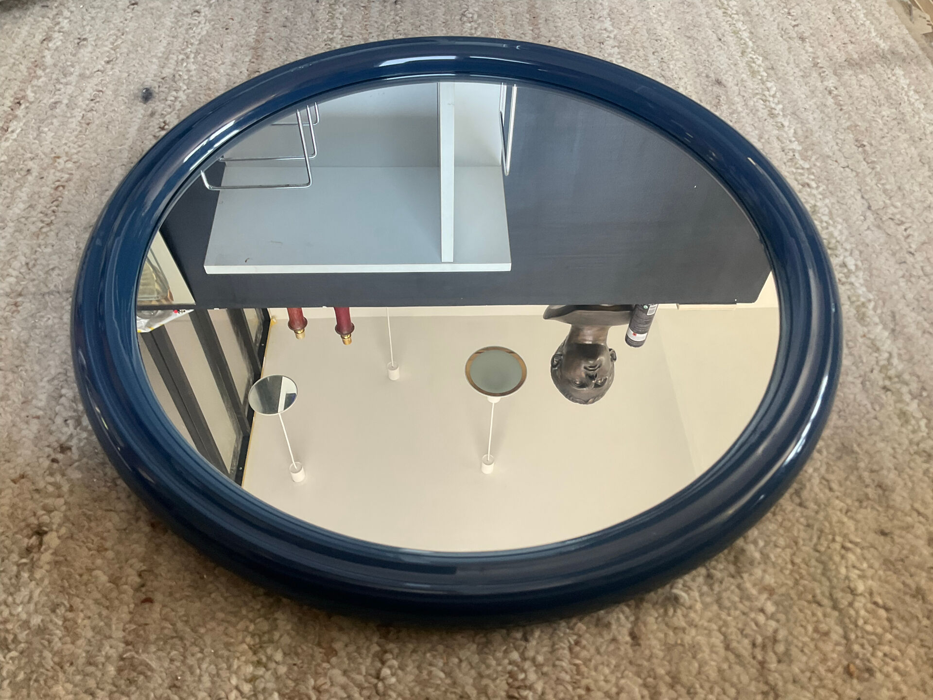 Round Tiger mirror from the 1970s.