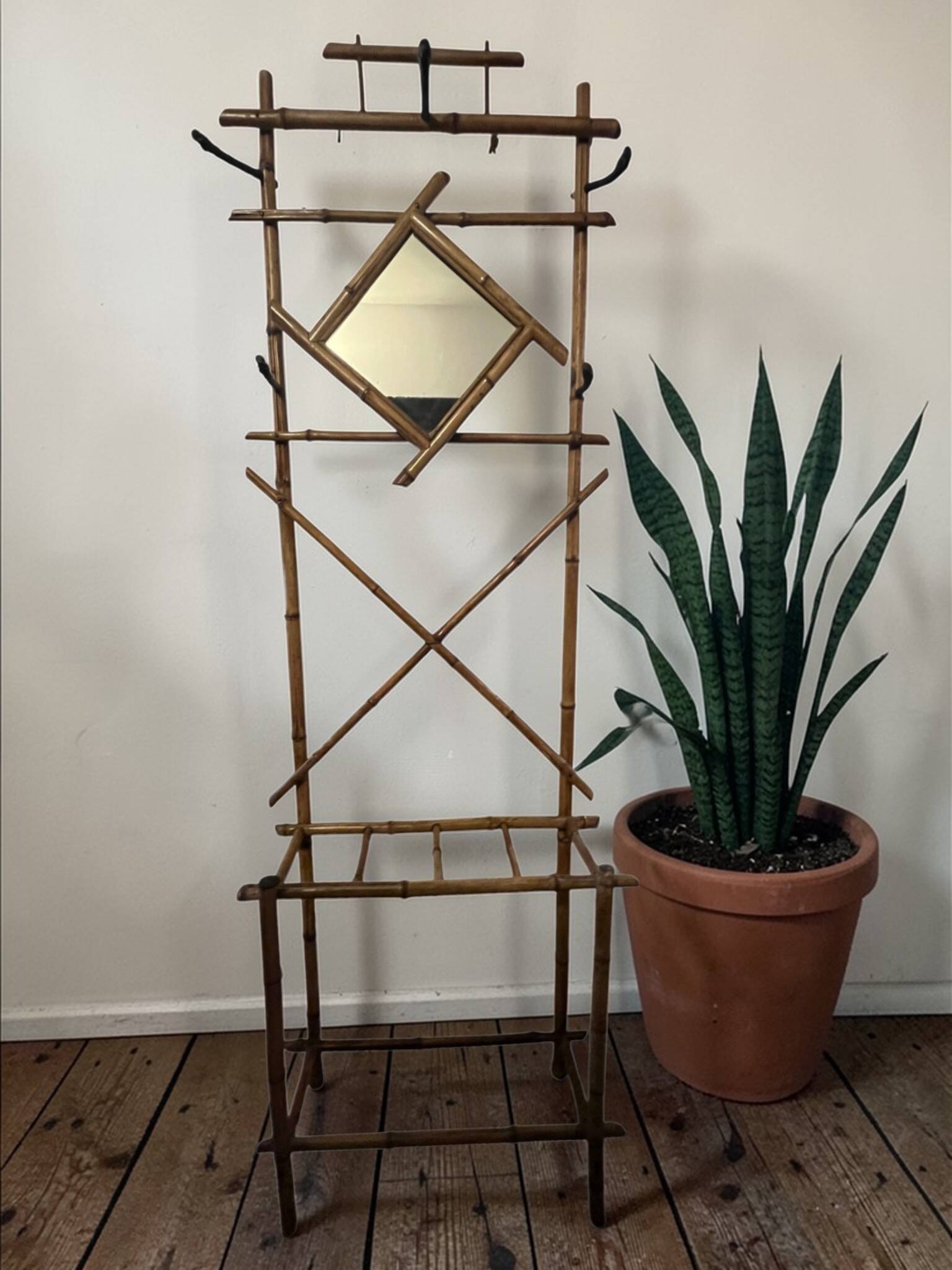 Art Deco, coat rack with bamboo mirror, diamond shape, around 1930.