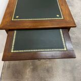 Louis XVI desk with green leather and shelves.