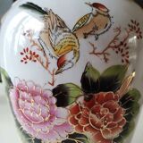 Chinese polychrome porcelain base. Peacock/birds of paradise designs. Corolla-shaped collar with ribbon. 30 x 15 cm