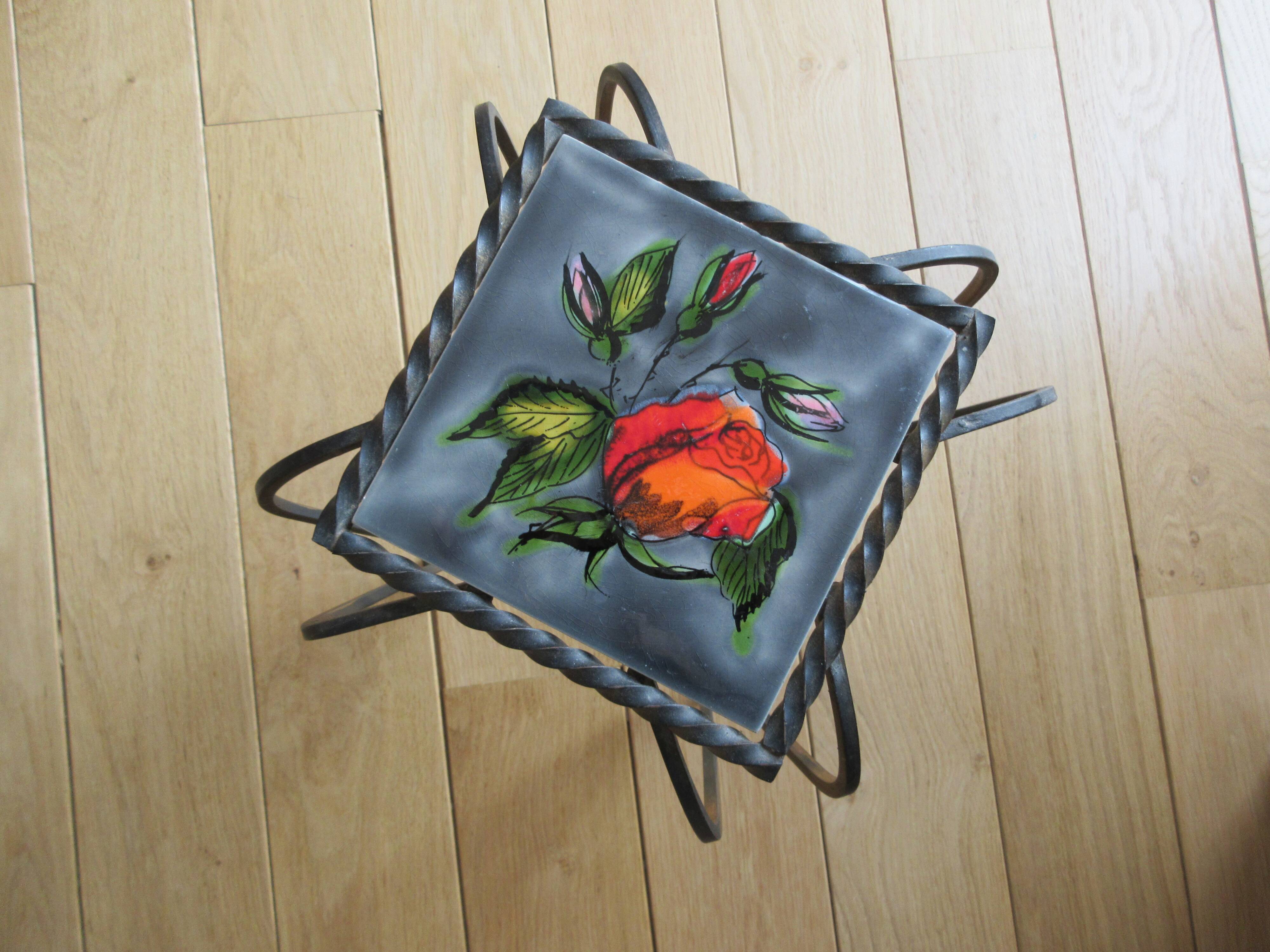 wrought iron and earthenware tile side table
