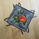 wrought iron and earthenware tile side table