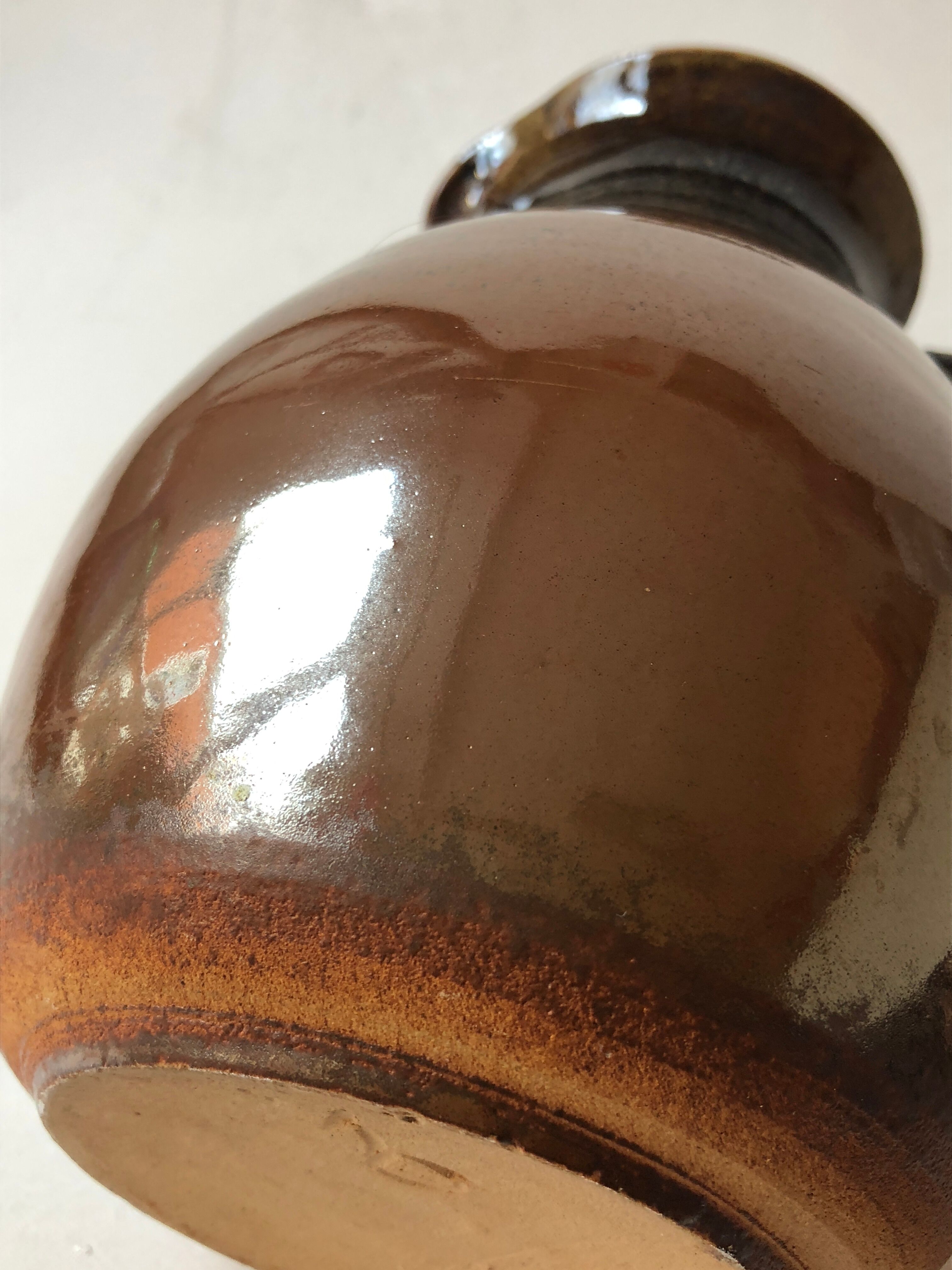 Glazed stoneware jug signed "KD".