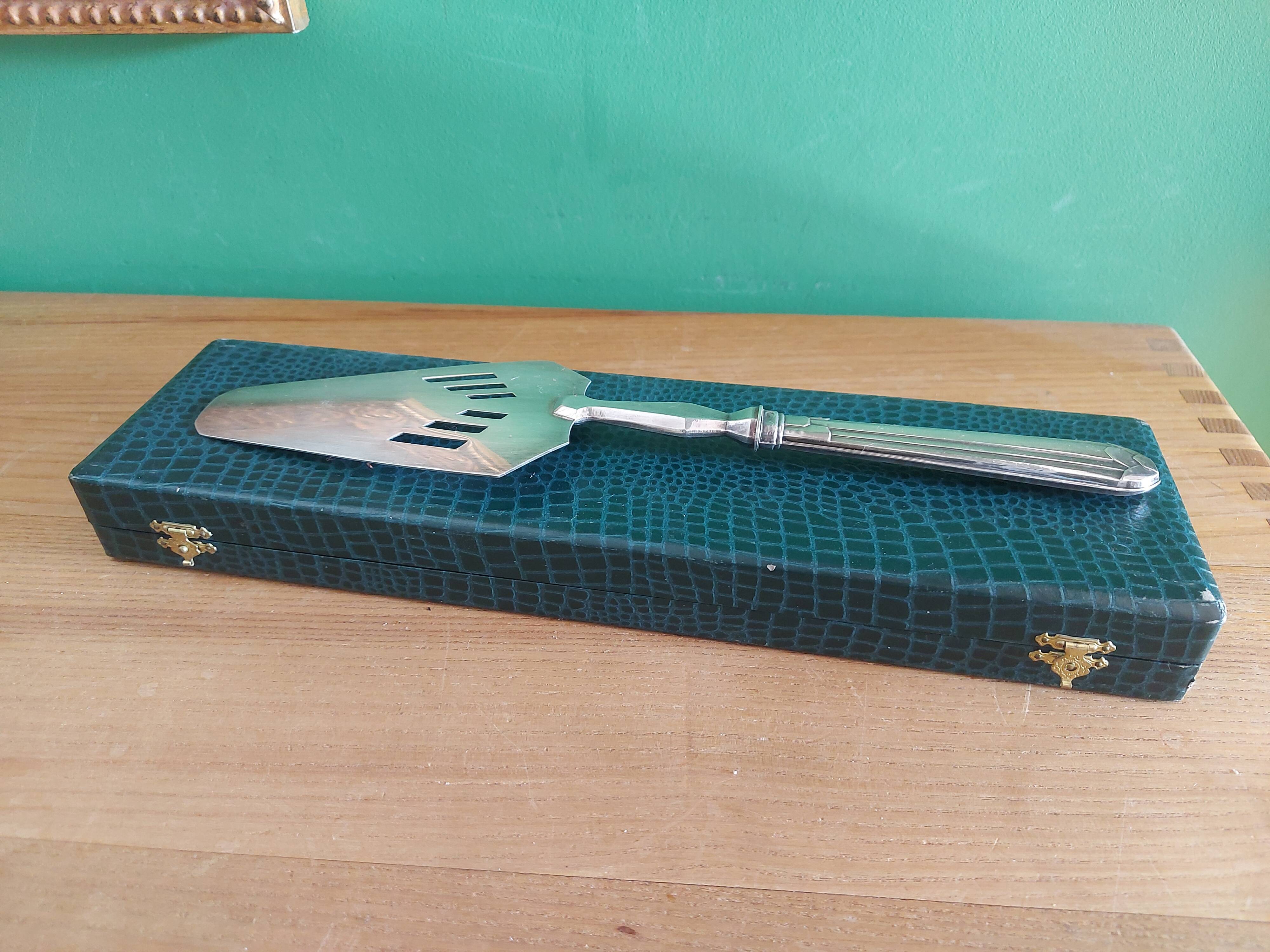 Filled silver shovel , art deco