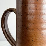 Large, handcrafted, speckled stoneware pitcher