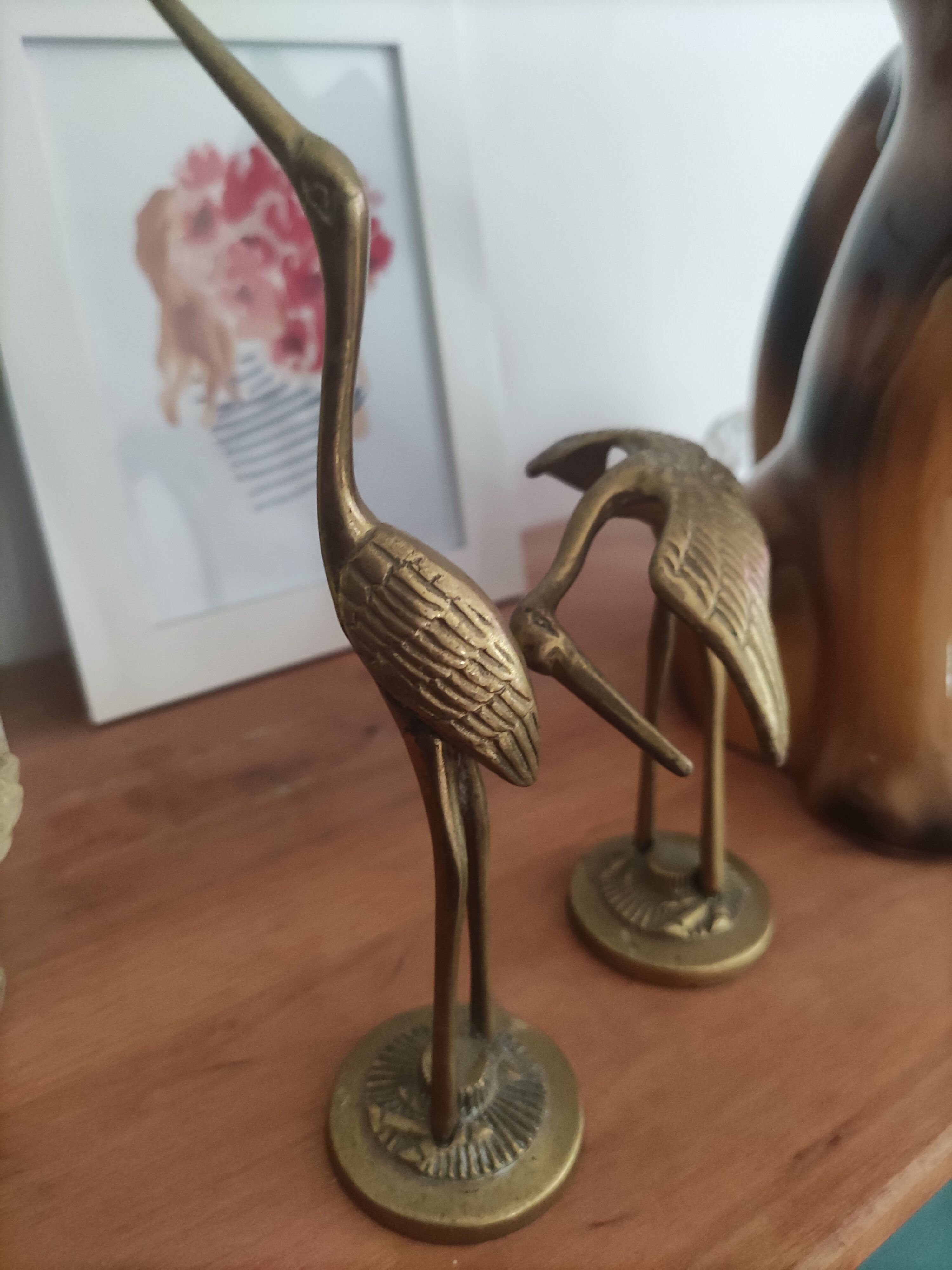 Brass heron duo