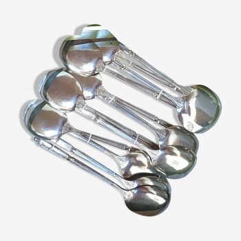 Punched silver metal ice spoons