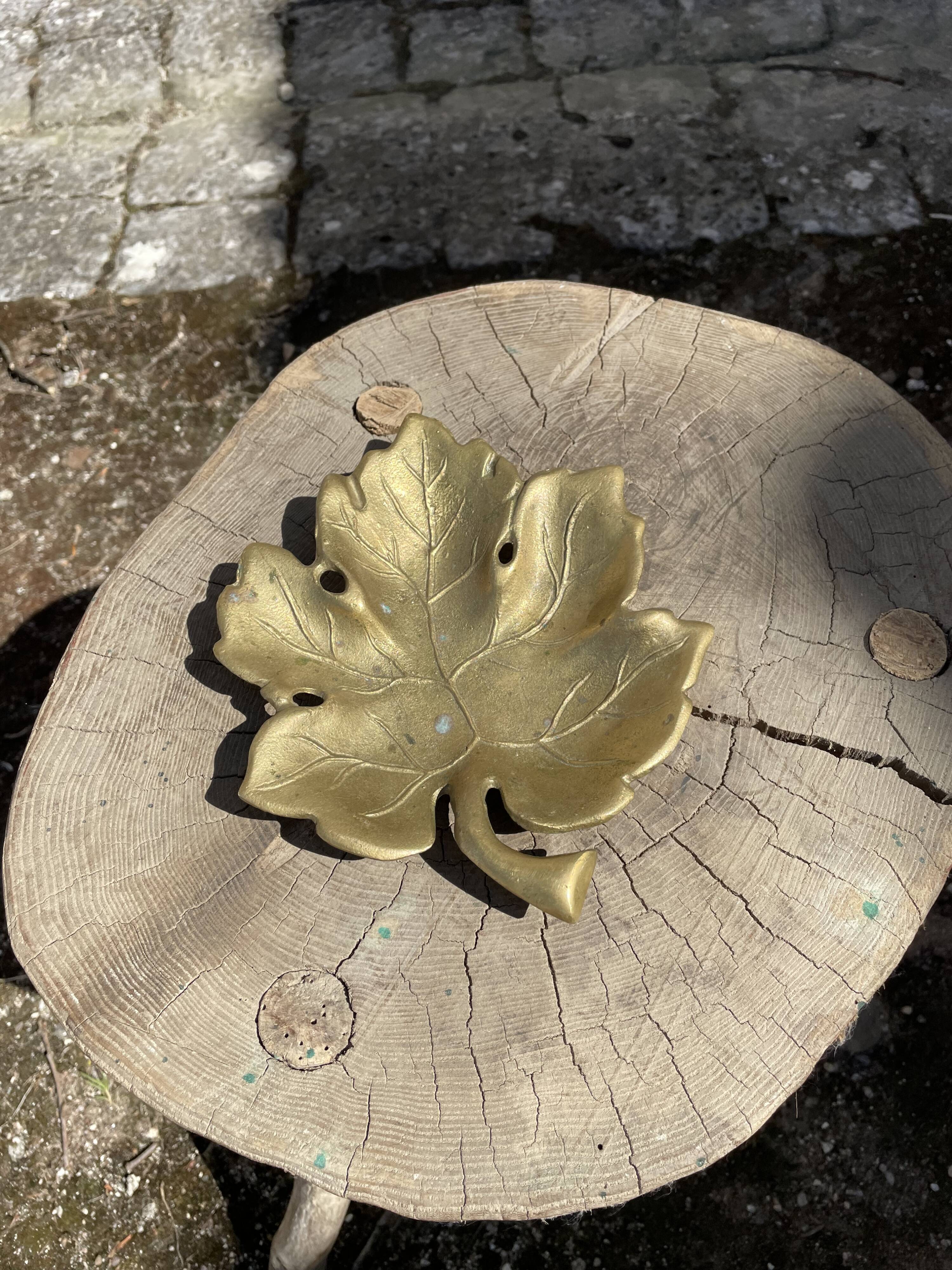 Empty brass leaf pocket