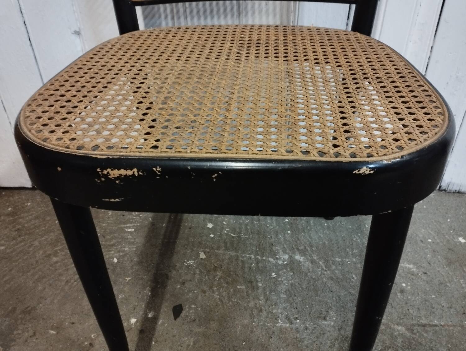 Wooden and cane chair