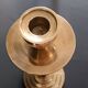 Two vintage wooden and brass candlesticks.