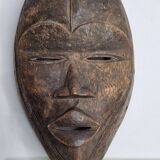 Dan mask in carved wood, brown patina, Ivory Coast, 25 cm