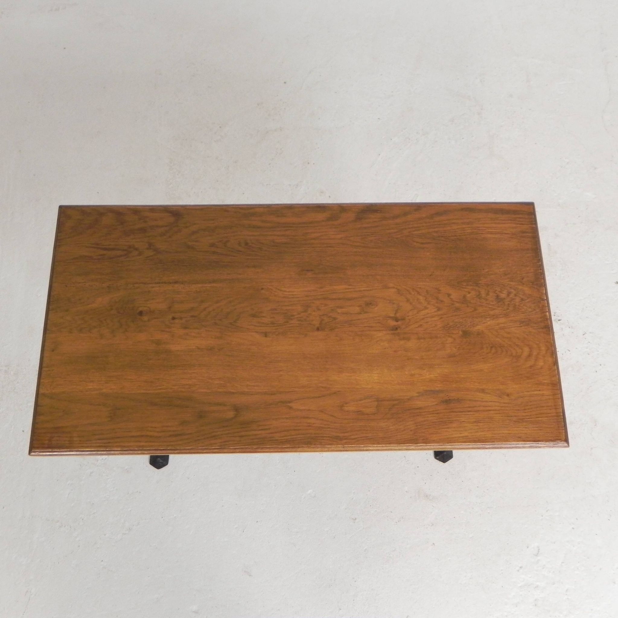 Bistro table with an oak top on a cast iron base, 1930s.