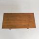 Bistro table with an oak top on a cast iron base, 1930s.