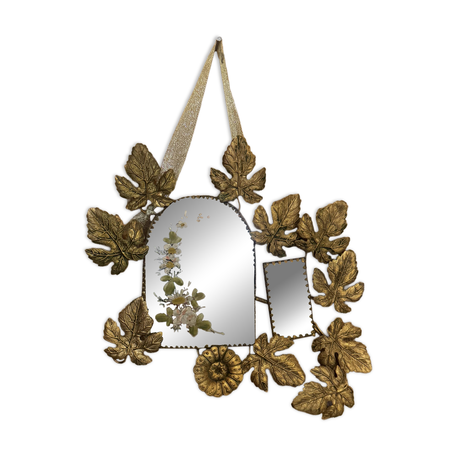 Ornamental brass mirror