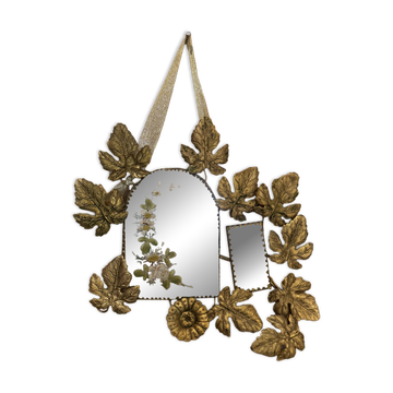 Ornamental brass mirror