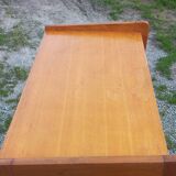 Vintage oak commode with tapered legs and wings from the 1950s.