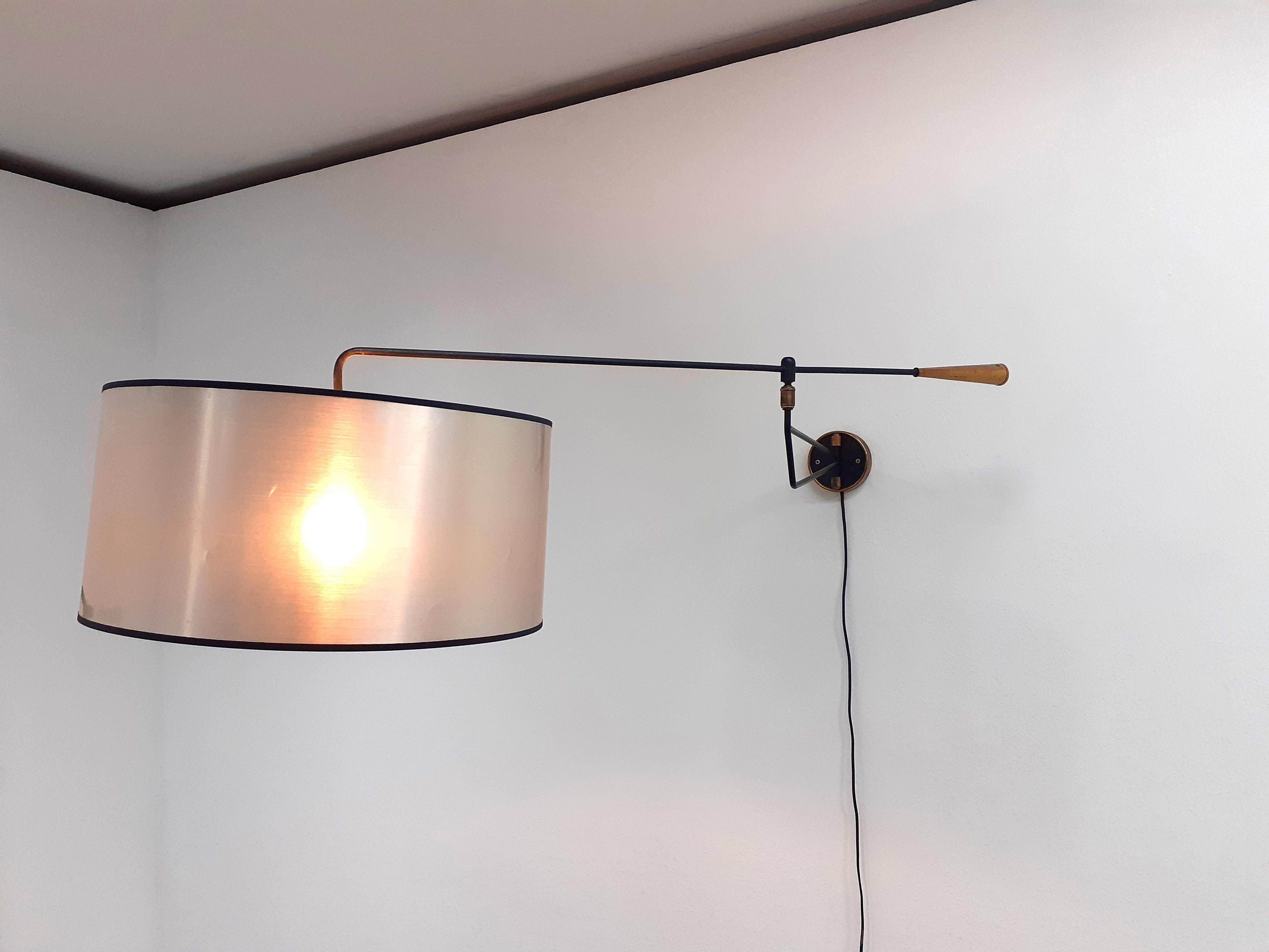 Metal and brass articulated sconce edited by Lunel, 1950s